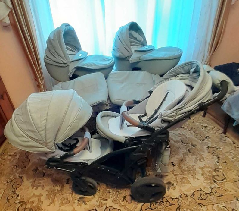 Універсальна коляска для двійнят Tako
