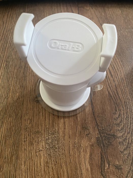 Uchwyt Oral-B na telefon