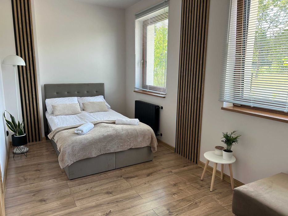 Pod Brzozami-domki całoroczne Balia jacuzzi noclegi Bałtów