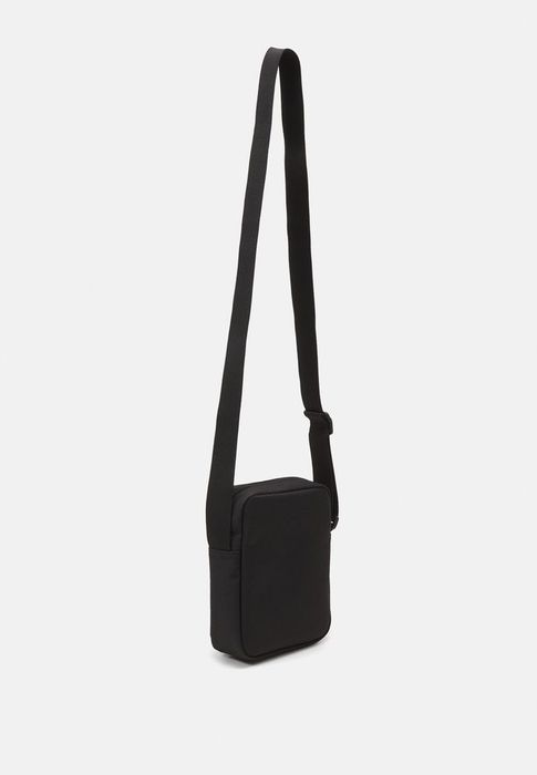 Сумка мужская  Lacoste чоловіча сумка  VERTICAL CAMERA BAG UNISEX