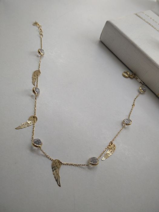 Złota bransoletka z cyrkoniami i skrzydłami złoto 585  dł. 21cm 964