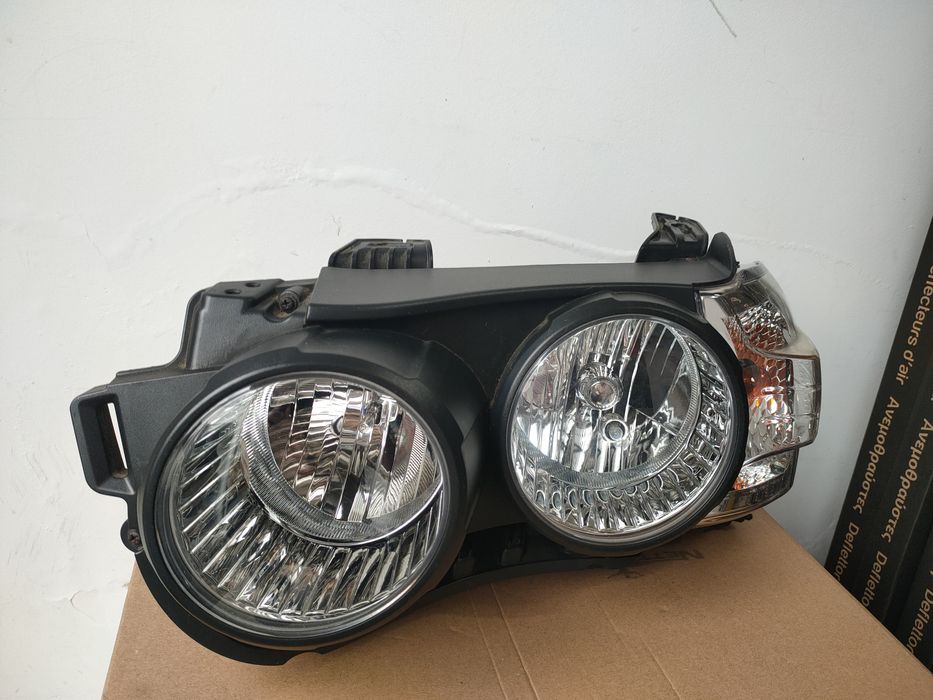 Farol ESQ e DRT CHEVROLET AVEO Hatchback (T300)