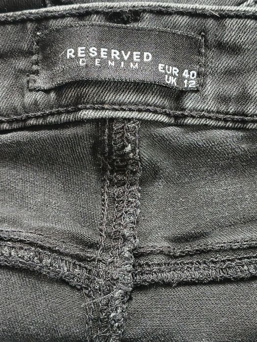 Spodnie damskie jeansowe wysoki stan Reserved
