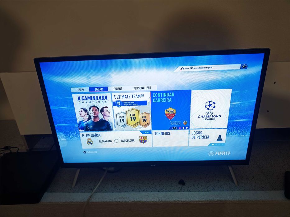 PS4 slim 1TB com dois jogos e TV 32 polegadas.