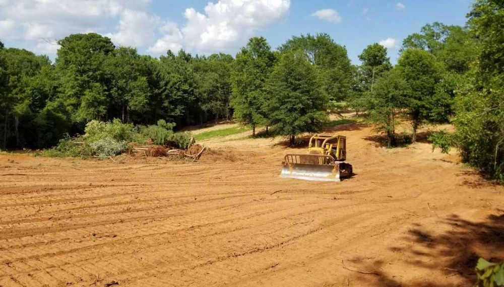 Zagospodarowanie terenu ,przygotowanie pod budowe, roboty ziemne,drogi