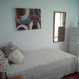 Quarto para estudante universitário em ambiente familiar nos Olivais
