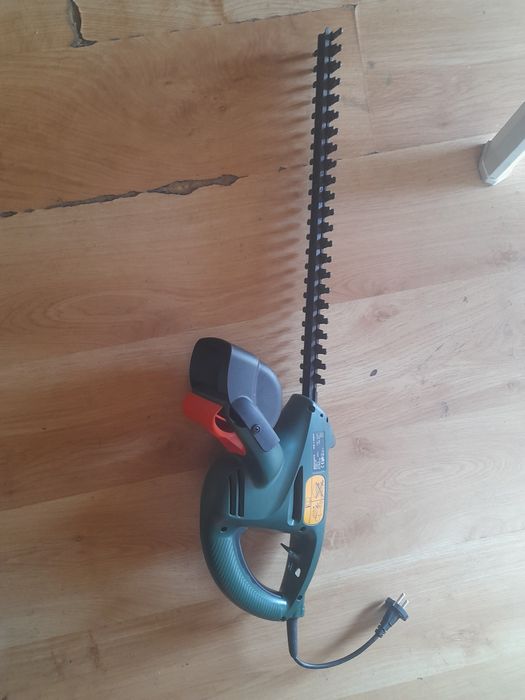Maquina de cortar sebes