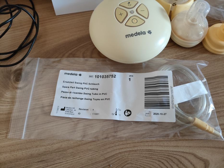 Laktator medela swing wraz z częściami zapasowymi