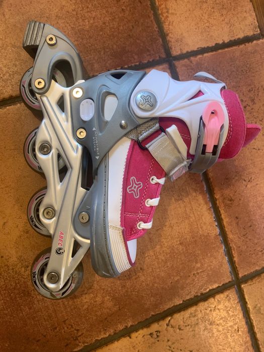 Patins em linha rosa
