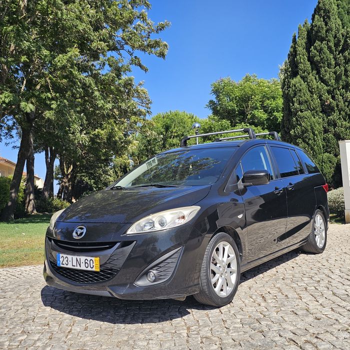 Vendo masda 5 de 2011 de 7 lugares com apenas 163 mil km esta rigorosamente impecável