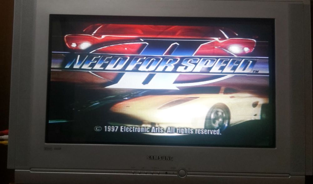 Ps1 fat com vários jogos 2 comandos originais e cartão de memória.