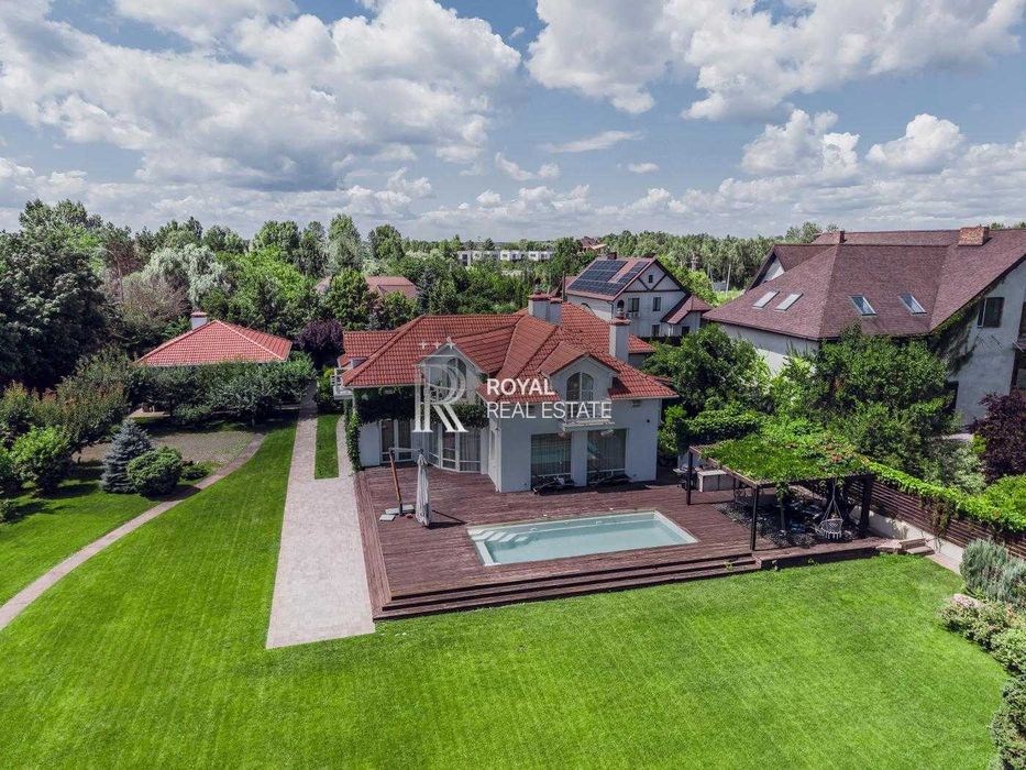 Продаж Будинок Вишеньки КМ «Княжий Затон» 3 кімнати 360 м² 40 соток Басейн Вихід до води Генератор Розумний дім Гараж на 2 авто Камін
