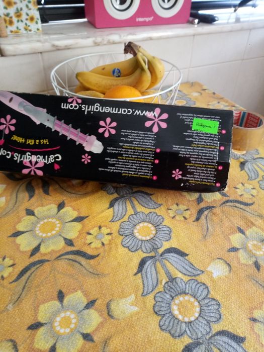 Ferro de encarrocolar o cabelo
