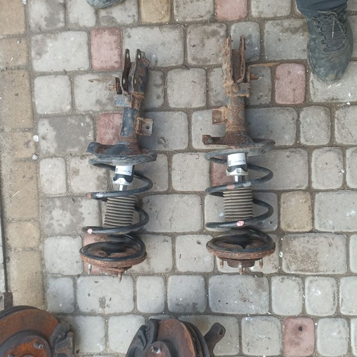 Стойка мітсубісі ланцер x Mitsubishi lancer 10 передня стойка взборі