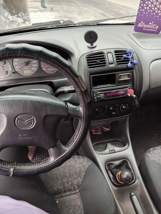 Продам машину Mazda 323