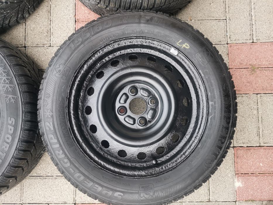 Felgi stalowe z oponami 15 " Toyota Corolla e12