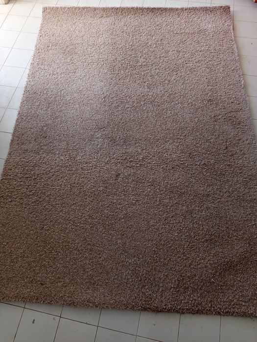 Tapetes de pêlo bege