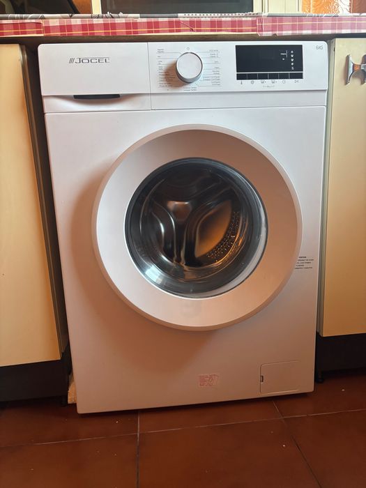 Máquina de lavar roupa como nova