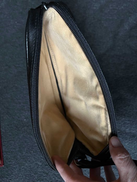 Męska saszetka na rękę skórzana