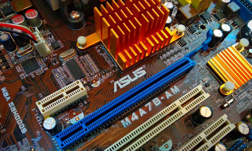 Материнська плата sAM3 Asus M4A78-AM + процесор + охолодження