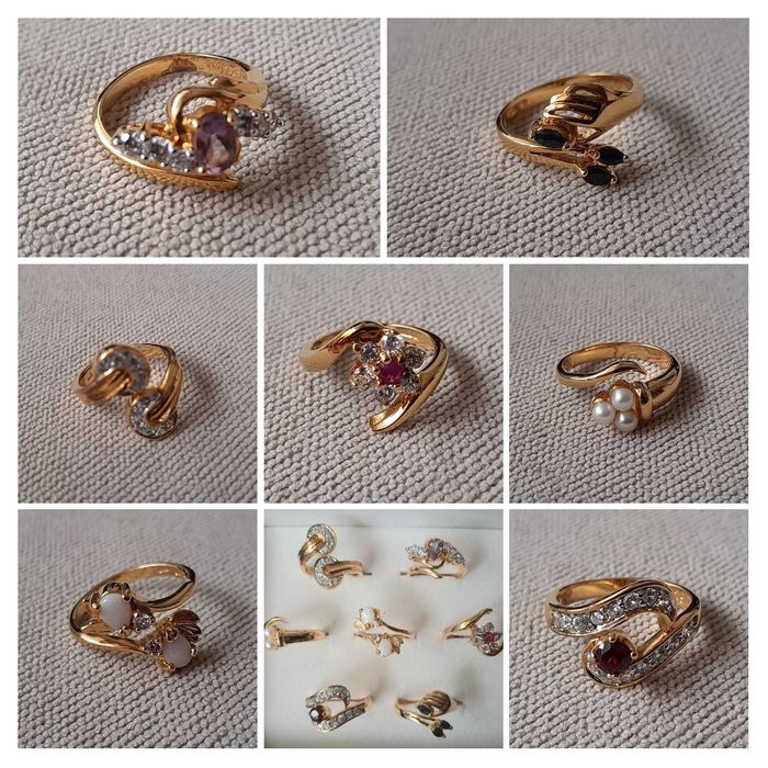 Conjunto de 7 anéis ajustáveis e respectiva caixa.