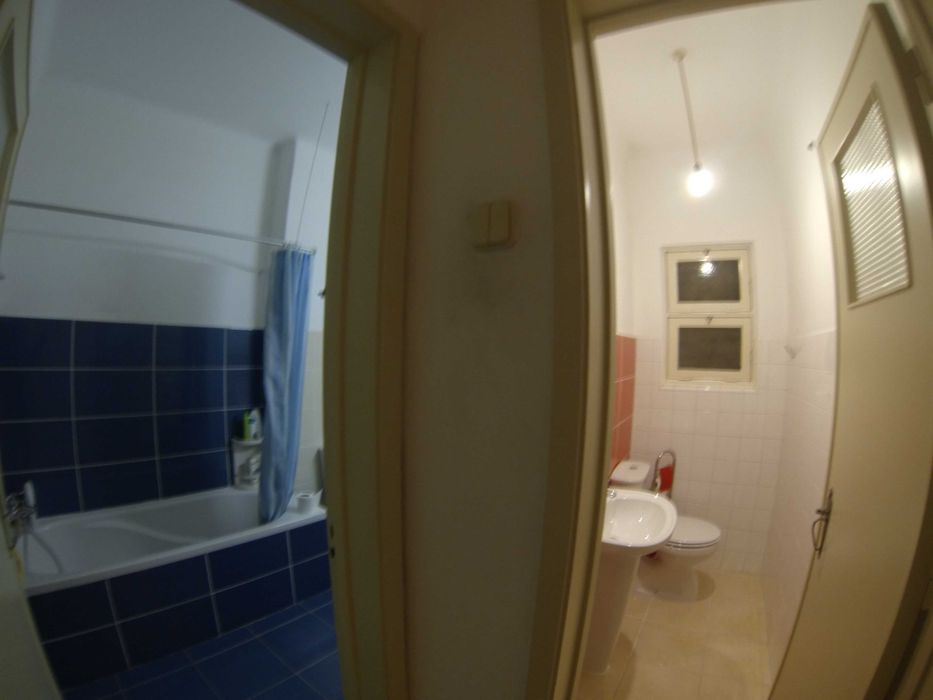 Quarto no centro de Portimão com varanda