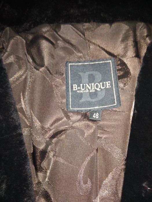 Мутоновая шуба с капюшоном.