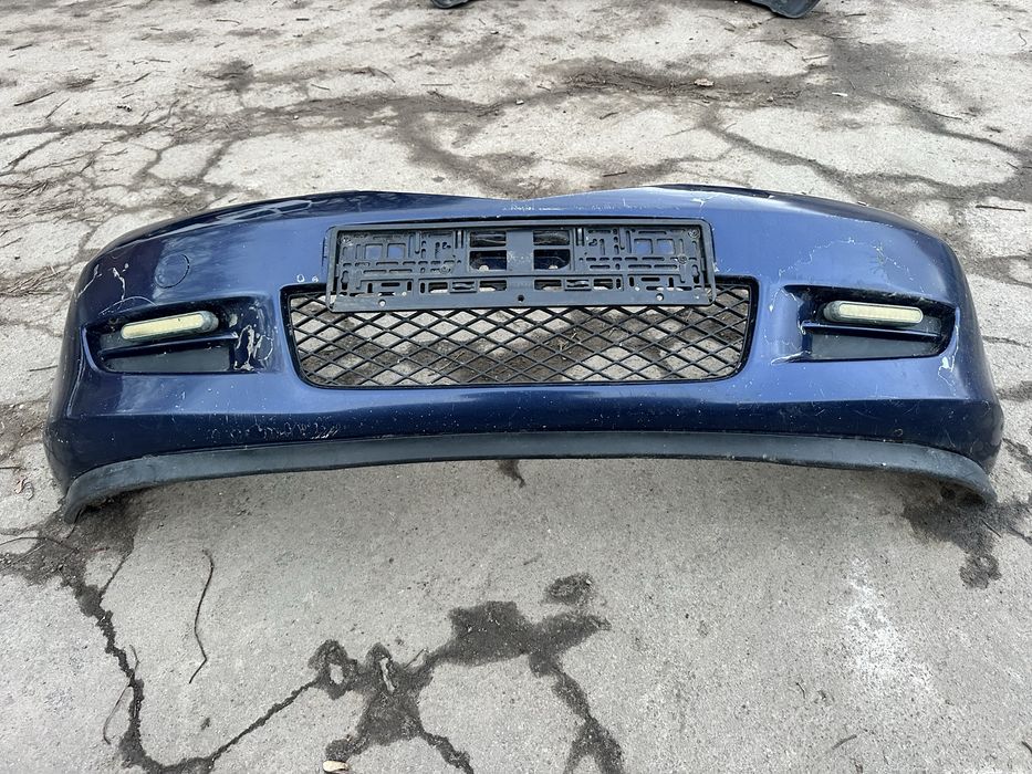 Передній бампер Mazda 2  Мазда 2 2003-2007