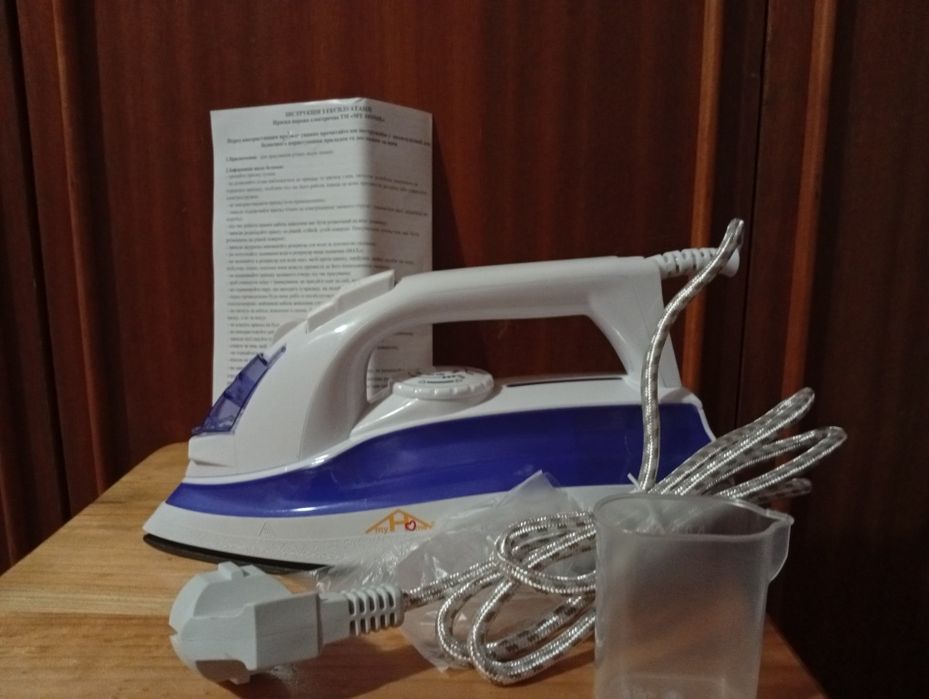Паровий утюг для дому