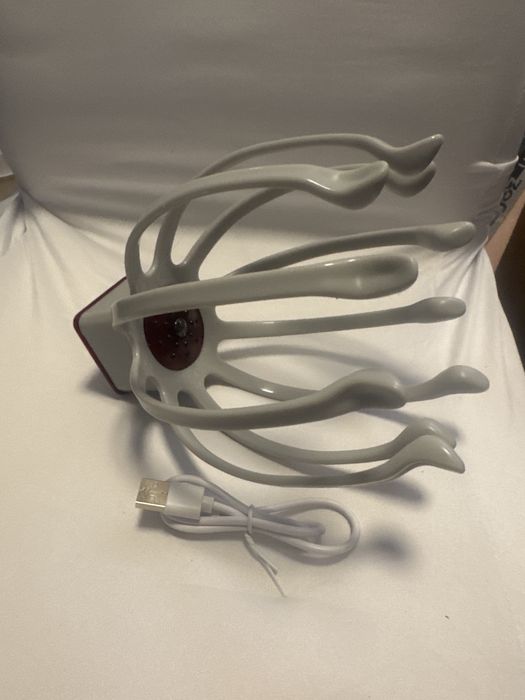 Elektryczny masażer do głowy