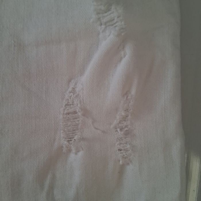 Jeansy białe Monnari