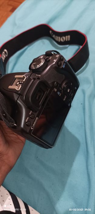 Câmera fotográfica Canon e lente