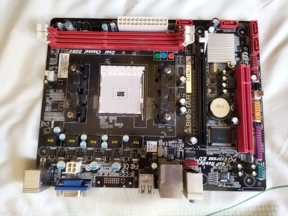 Материнська плата Biostar