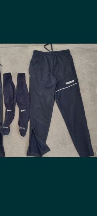 Saller spodnie pilkarskie 128 i getry Nike