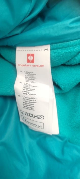 Damska kurtka funkcjonalna marki Engelbert Strauss w kolorze turkusowym.