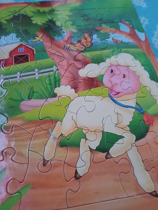 2 książki z puzzlami