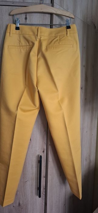 Żółte spodnie garniturowe eleganckie 36 s biurowe
