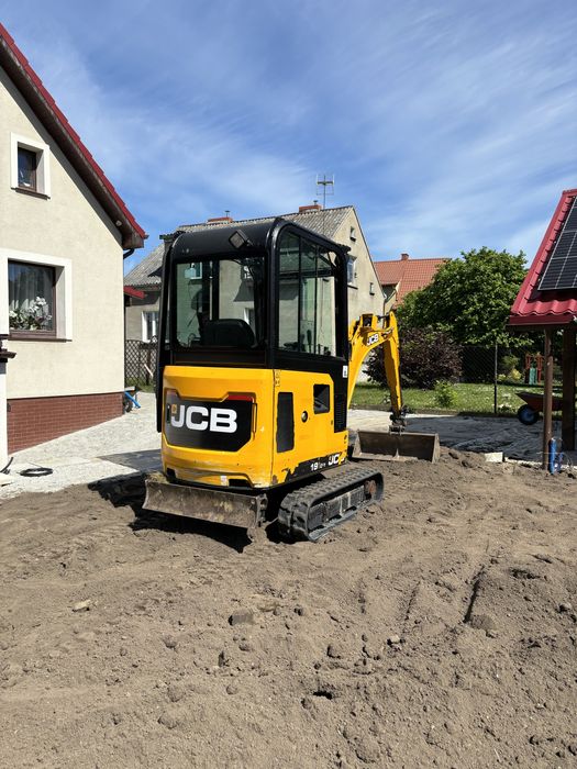 Uslugi koparką ładowarką  koparką kołową minikoparką ziemia piasek transport