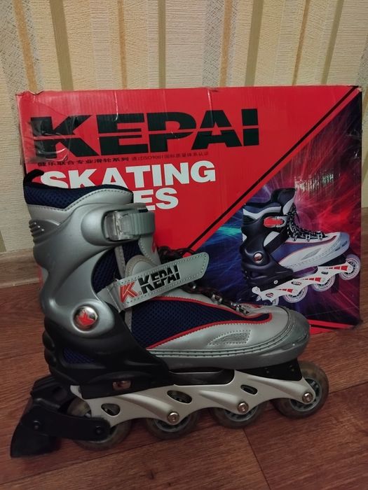 Роликовые коньки