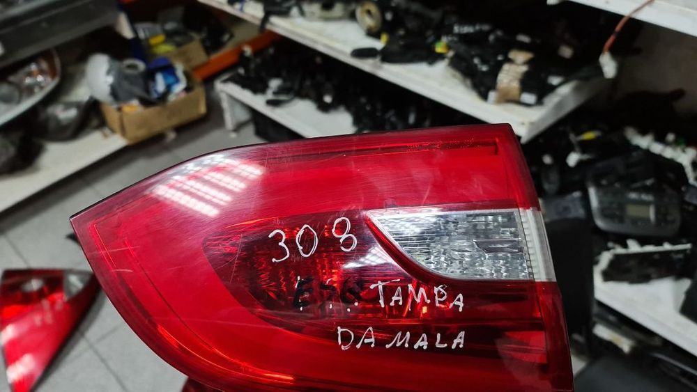 FAROLIM ESQ. TAMPA DA MALA PEUGEOT 308