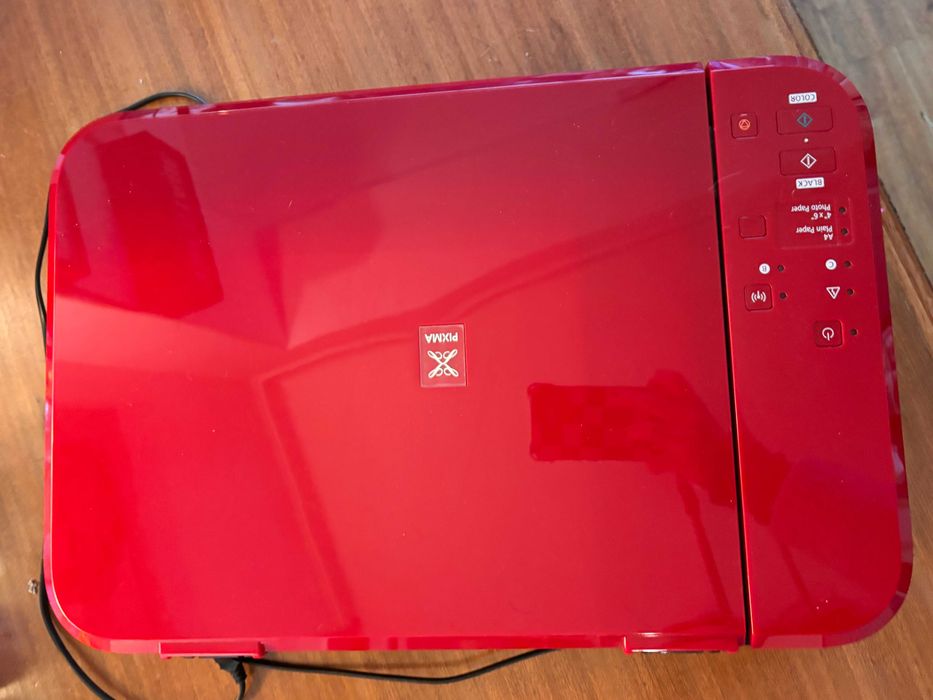 Canon PIXMA MG3650S wireless inkjet printer in a bold red finish.