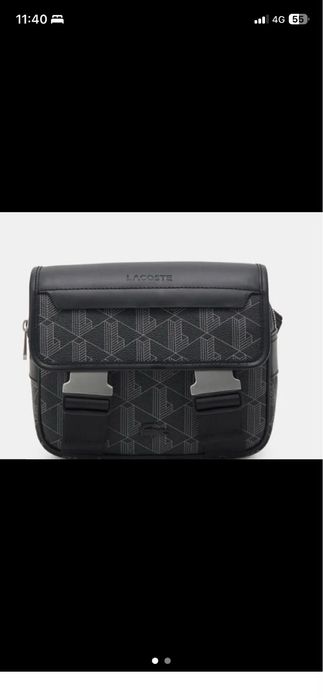 Bolsa da Lacoste original. Le a discrição.