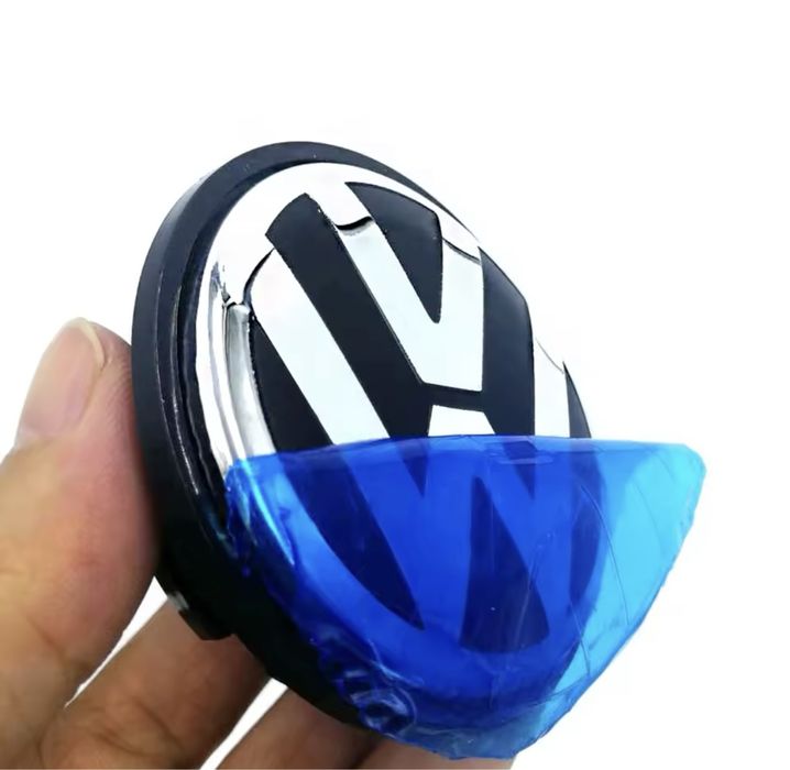 VW Dekielki kapsle do felg 70/62 mm 7L6601.149B logo VW nowe 4 szt