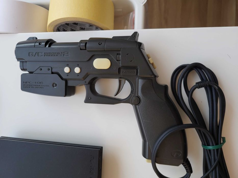 Sony PlayStation 2 – com jogos e uma pistola