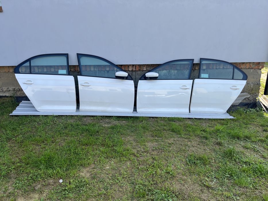 Двері шкода Рапід Skoda Rapid