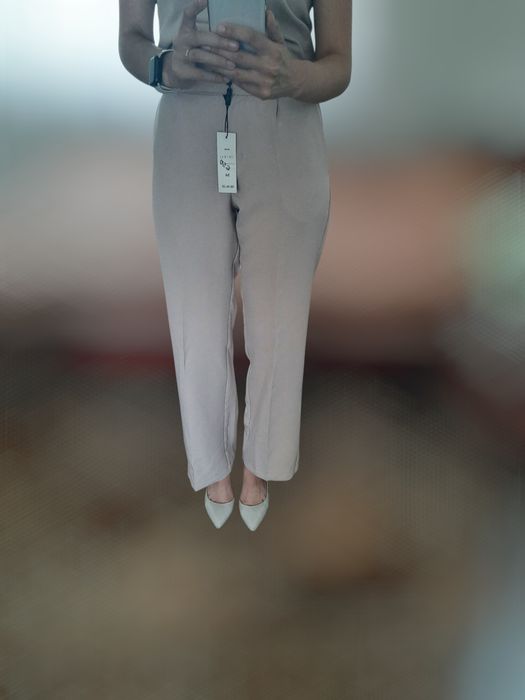 Нові брюки бежевого кольору