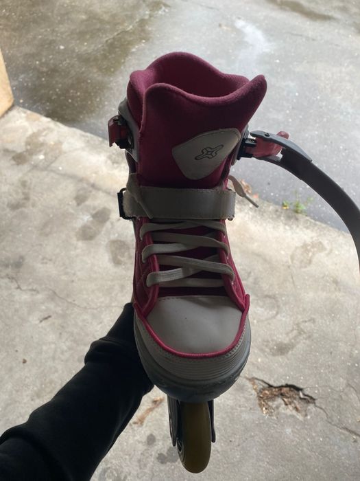 Patins em linha rosa e choc vi