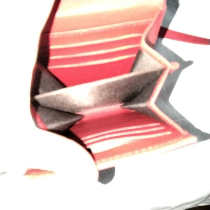 Bolsa tiracolo vermelha para carregar telemóvel e cartões nunca usada