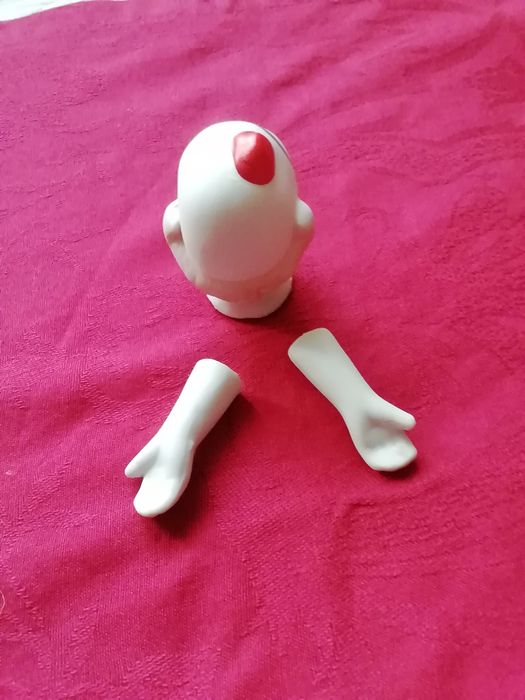 Cabeça e mãos de palhaço