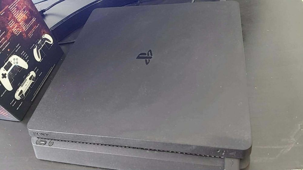 Playstation 4 + Comando Wireless + 15 jogos